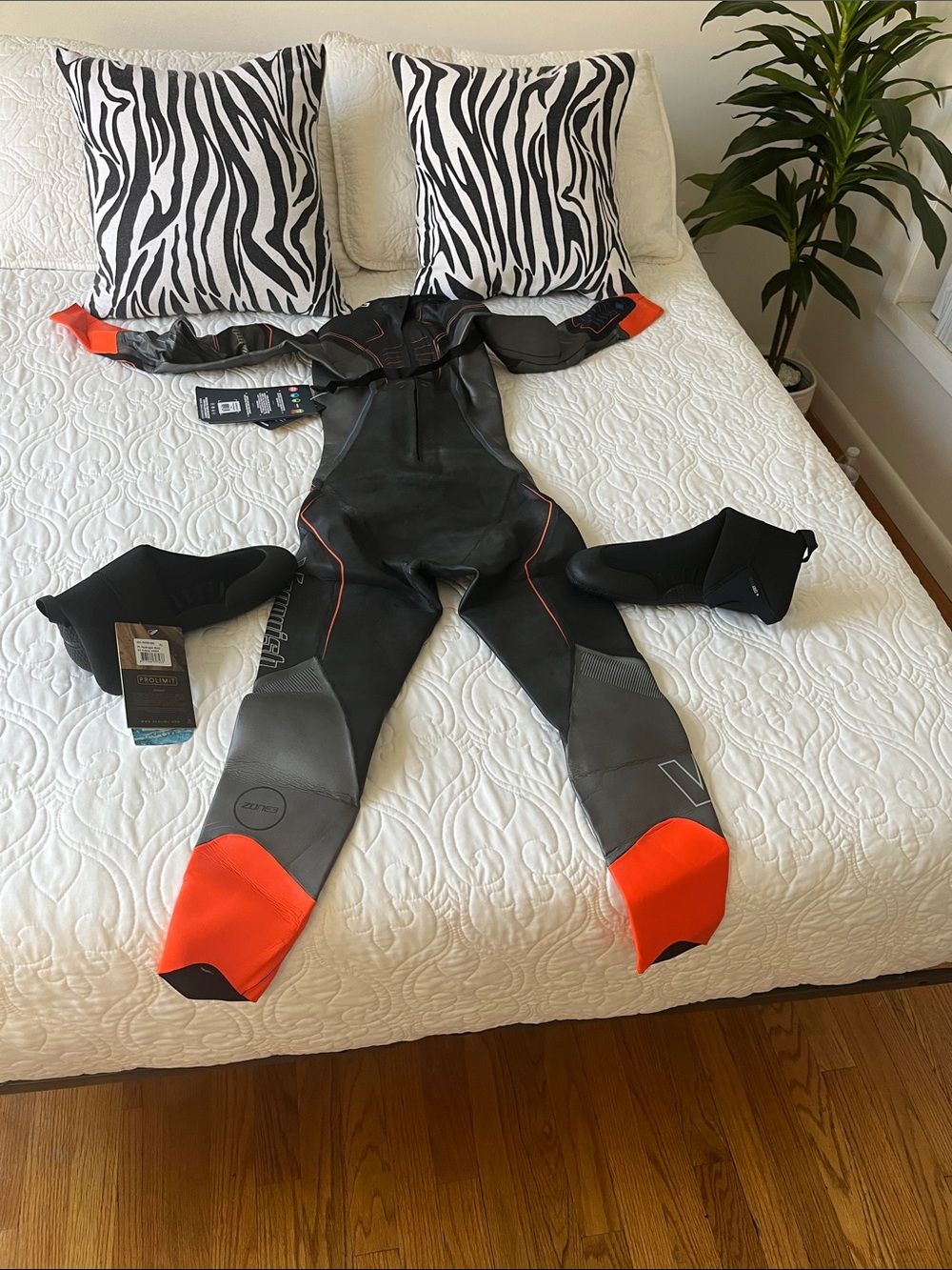 Men's Openwater Wetsuit - Black with Orange Accents.